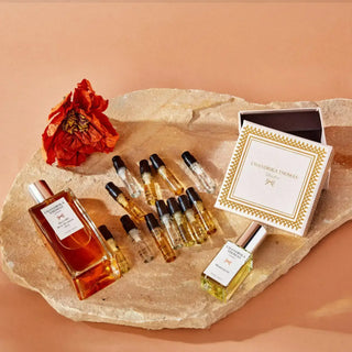 Image of 100ml Allure rose blossom oud perfume, 15ml marrakesh perfume and twelve exqusite perfume samples with a beautiful gift box